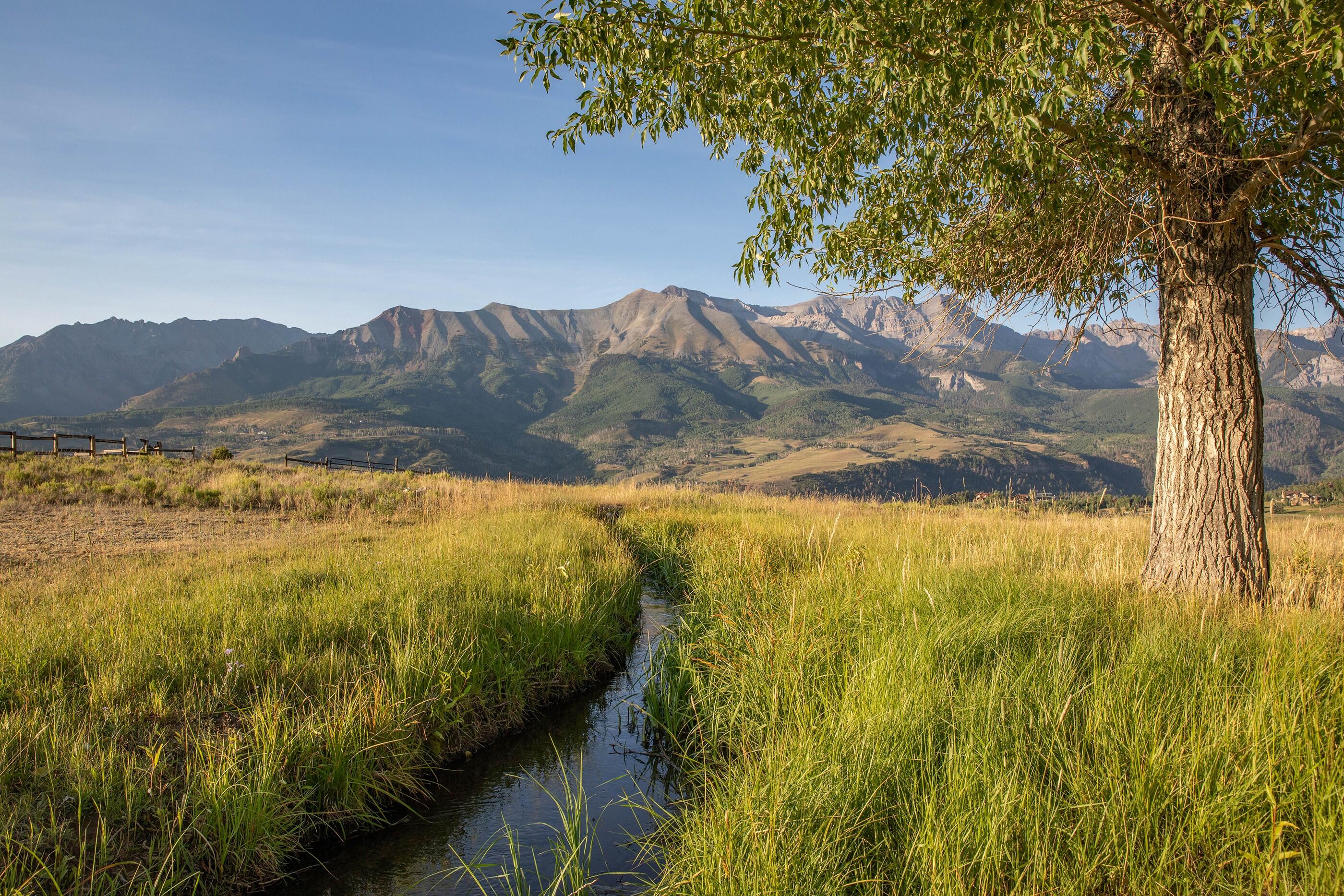 975 B Wagner Way Telluride, CO 81435 - Photo 7 of 20 a view of an ocean from a mountain