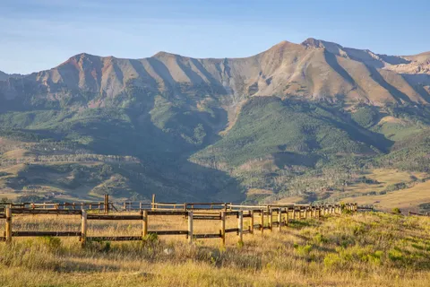 a view of a swimming pool with mountain view