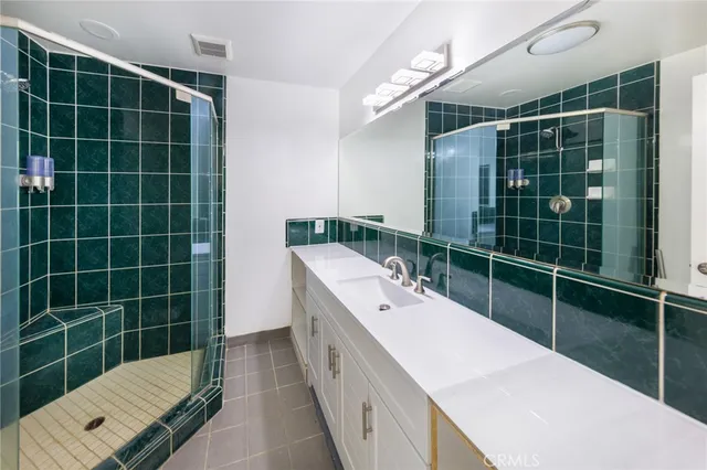 a bathroom with a bathtub and a sink