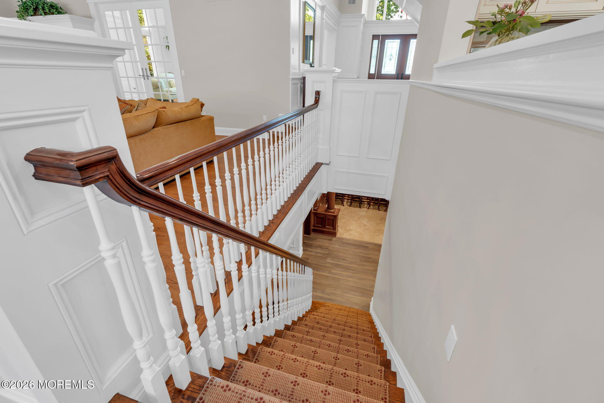 672 Winding River Road Brick, NJ 08724 - Photo 66 of 111 a view of entryway with wooden floor and stairs