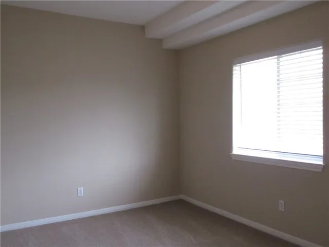 an empty room with a window