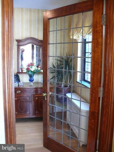 101 Overhill Road Baltimore, MD 21210 - Photo 1 of 24 a room with window and glass door