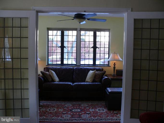 101 Overhill Road Baltimore, MD 21210 - Photo 2 of 24 a living room with a couch and a rug