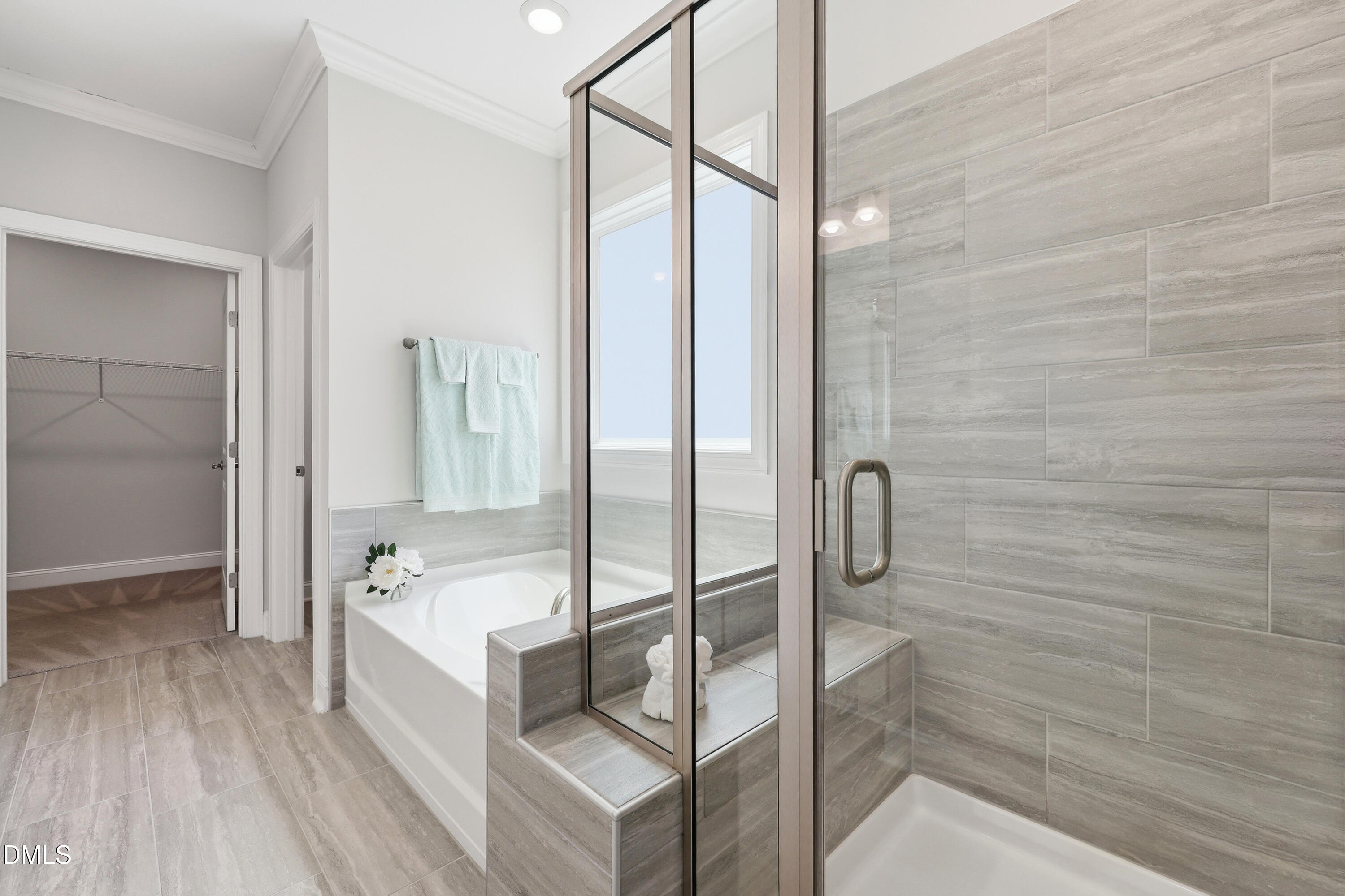 289 English Violet Lane Raleigh, NC 27610 - Photo 23 of 40 a bathroom with a bathtub and shower