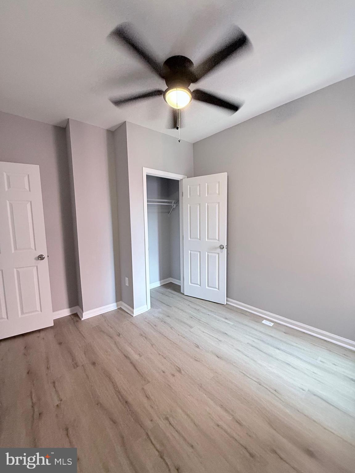 2415 Federal Street Baltimore, MD 21213 - Photo 28 of 35 a view of an empty room with wooden floor