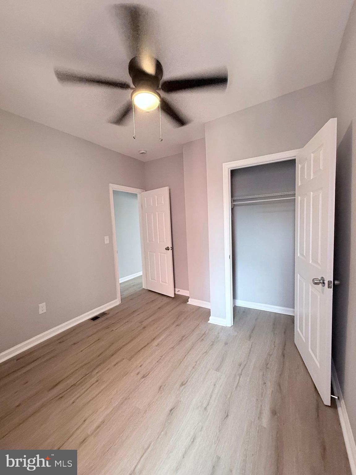 2415 Federal Street Baltimore, MD 21213 - Photo 29 of 35 a view of an empty room with wooden floor