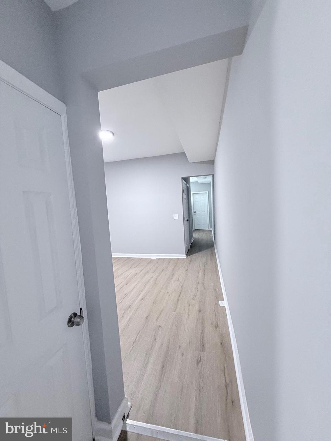 2415 Federal Street Baltimore, MD 21213 - Photo 7 of 35 a view of hallway with wooden floor