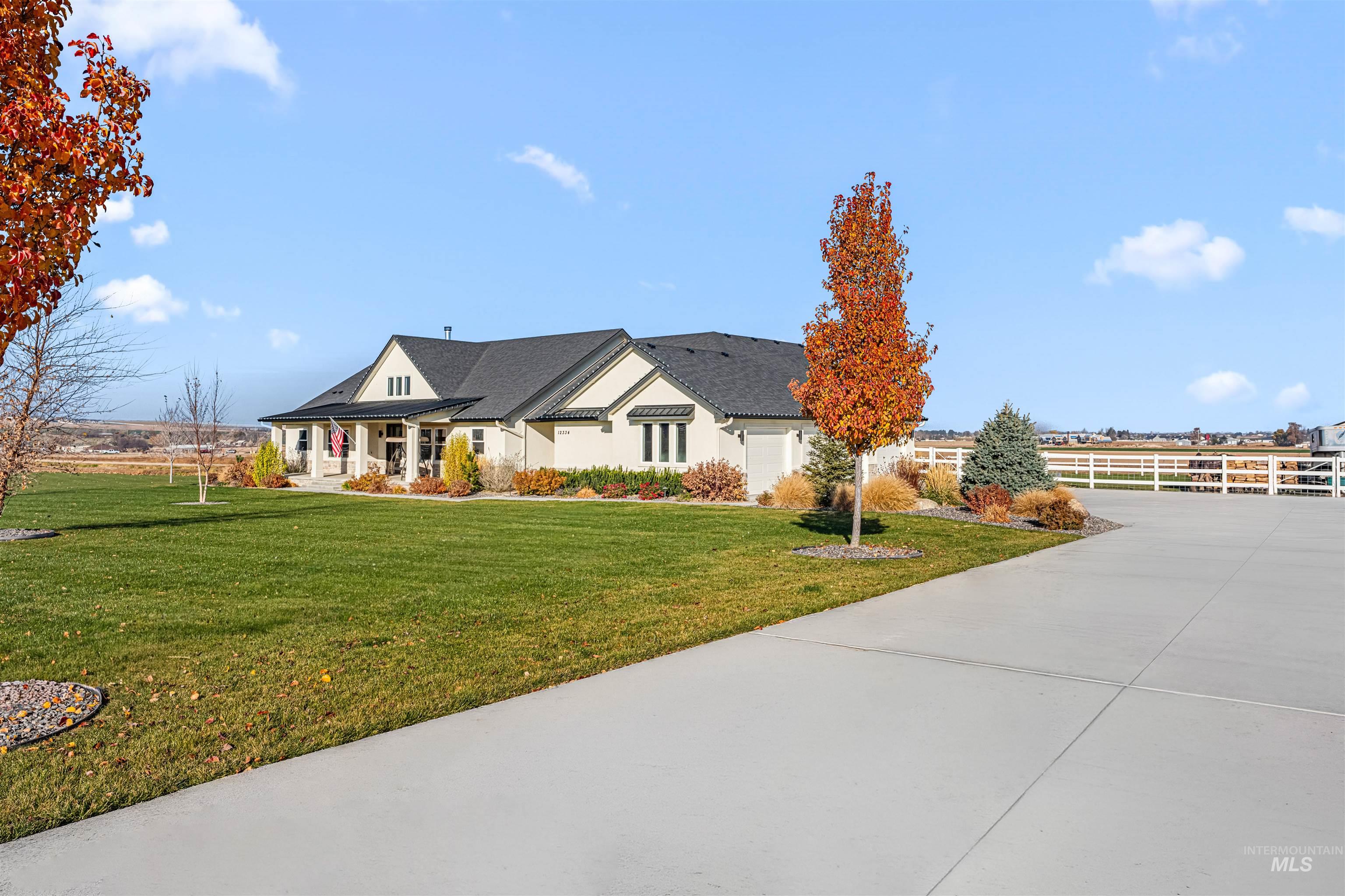 12334 Rivendell Court Nampa, ID 83686 - Photo 6 of 50 Modern farmhouse style home with covered porch and concrete driveway
