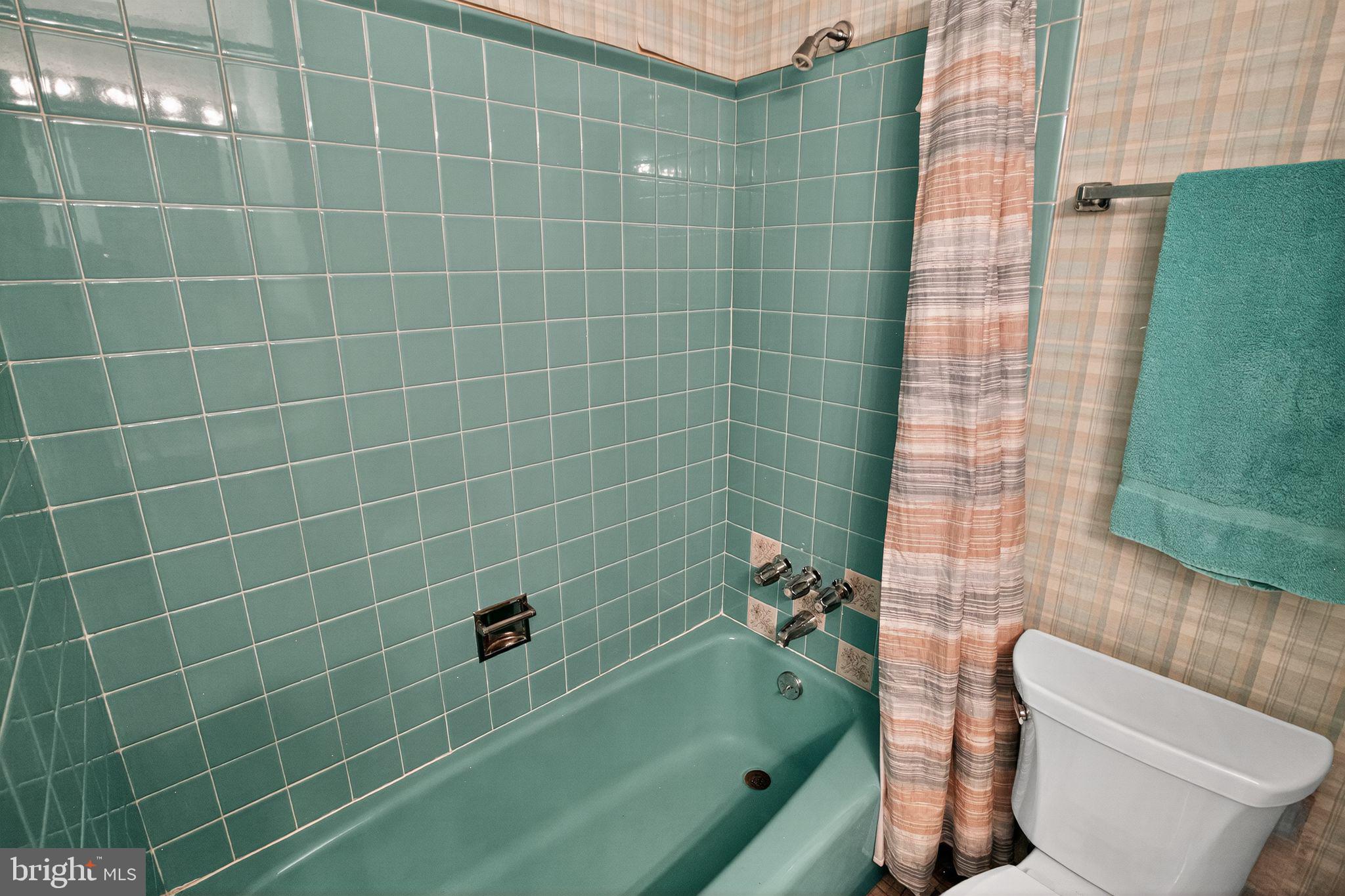 7374 Roxbury Avenue Manassas, VA 20109 - Photo 14 of 42 a bathroom with a sink and toilet