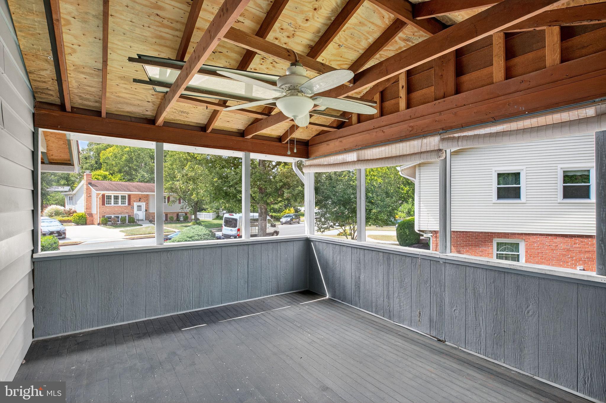 7374 Roxbury Avenue Manassas, VA 20109 - Photo 23 of 42 a view of a kitchen with a sink and wooden floors