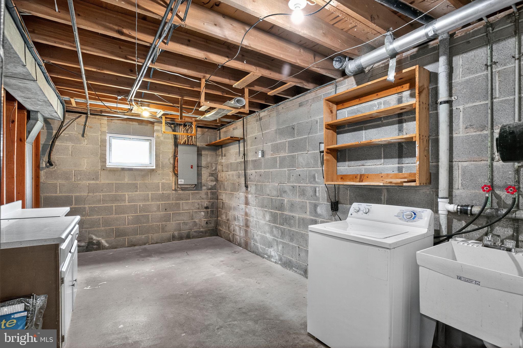 7374 Roxbury Avenue Manassas, VA 20109 - Photo 34 of 42 a utility room with dryer and washer