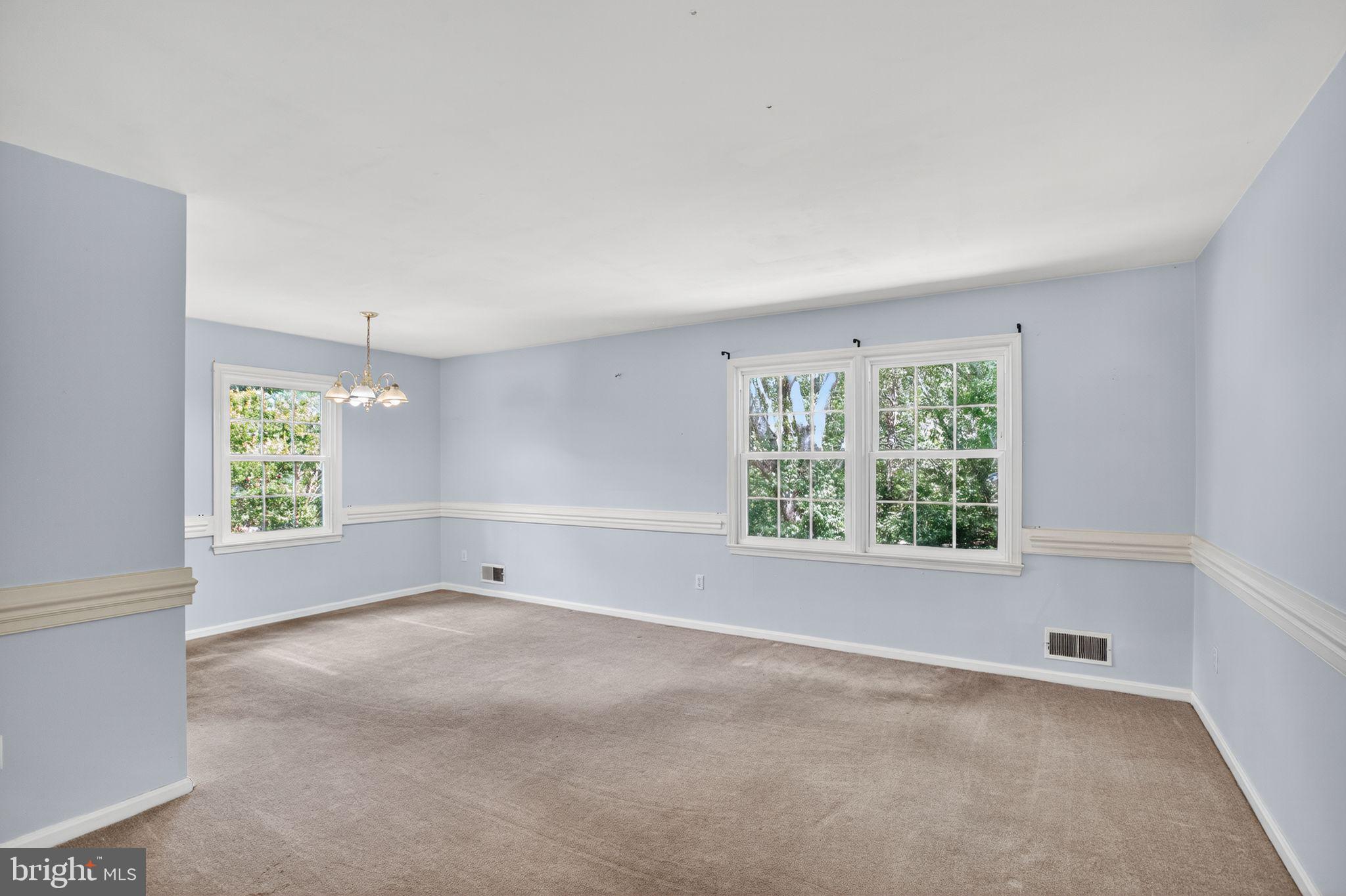 7374 Roxbury Avenue Manassas, VA 20109 - Photo 4 of 42 a view of an empty room with a window
