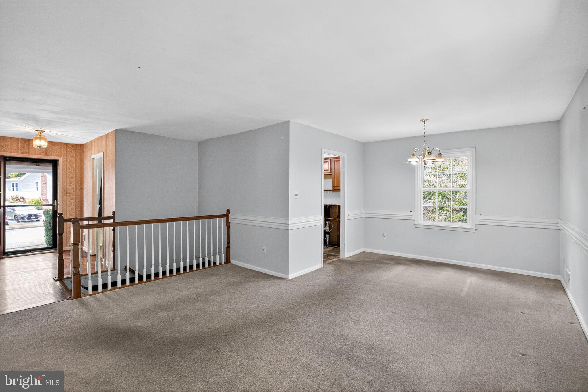 7374 Roxbury Avenue Manassas, VA 20109 - Photo 5 of 42 a view of an empty room with a window