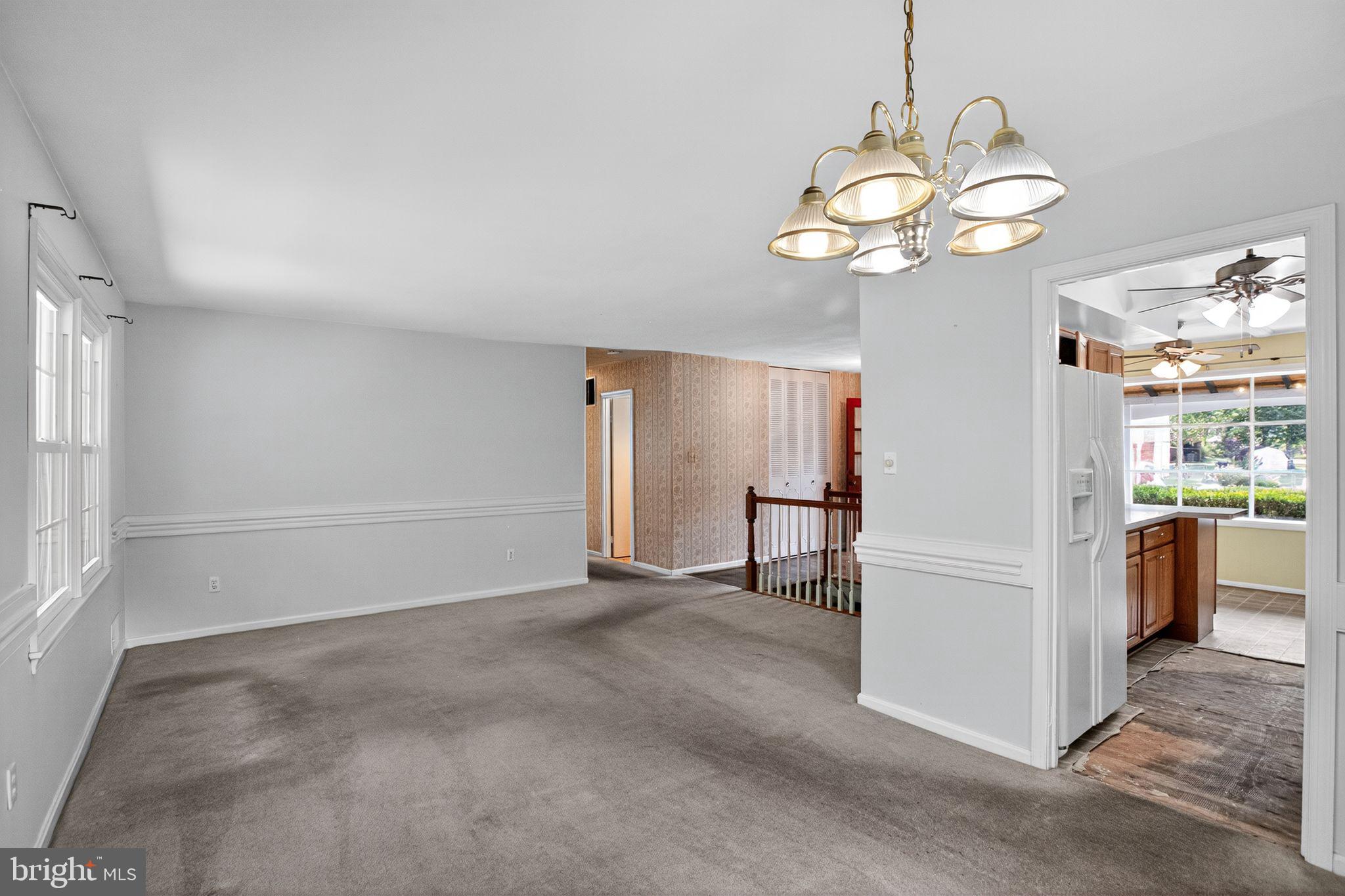 7374 Roxbury Avenue Manassas, VA 20109 - Photo 6 of 42 a view of a room with a chandelier