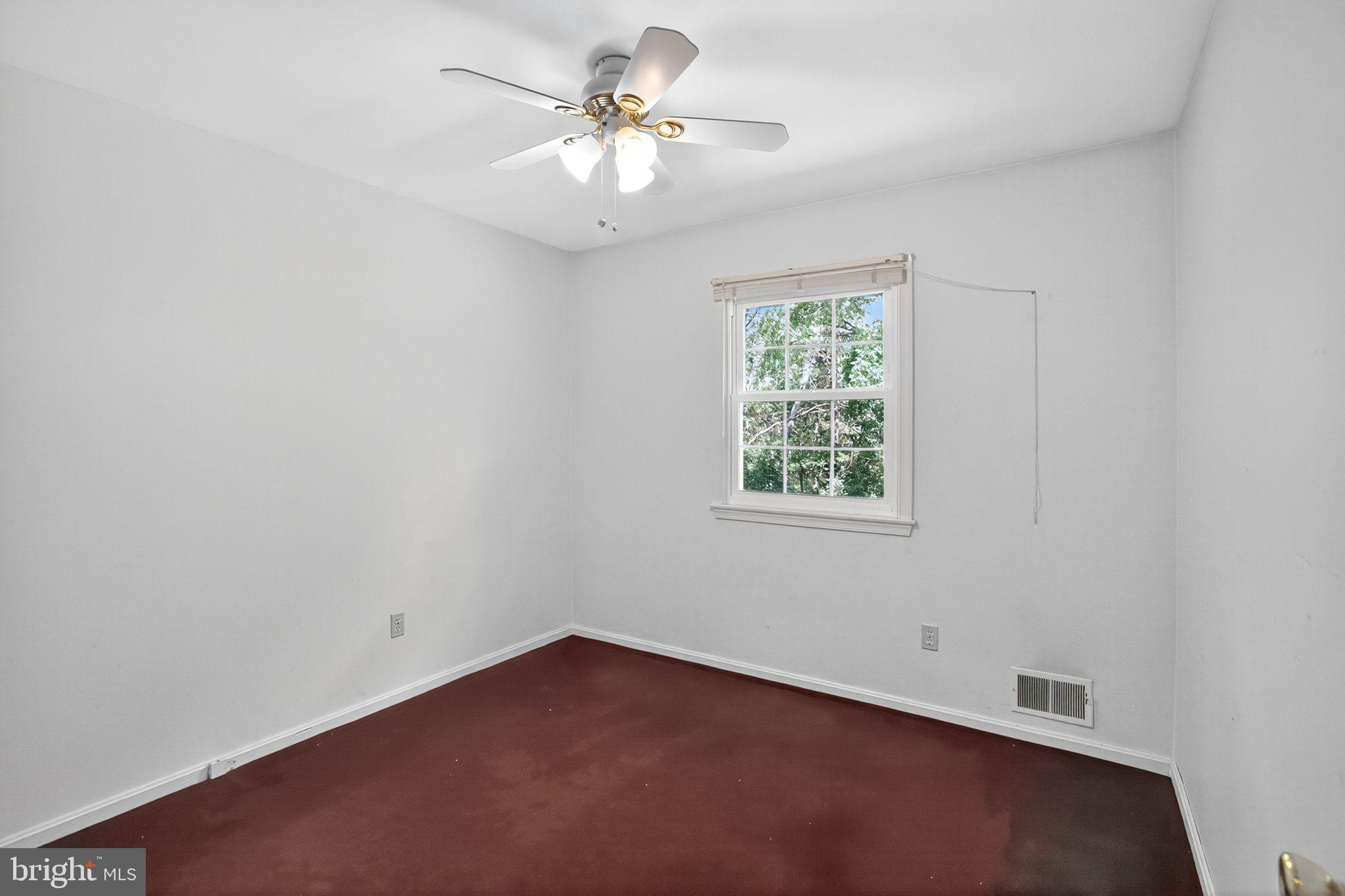 7374 Roxbury Avenue Manassas, VA 20109 - Photo 7 of 42 an empty room with a window