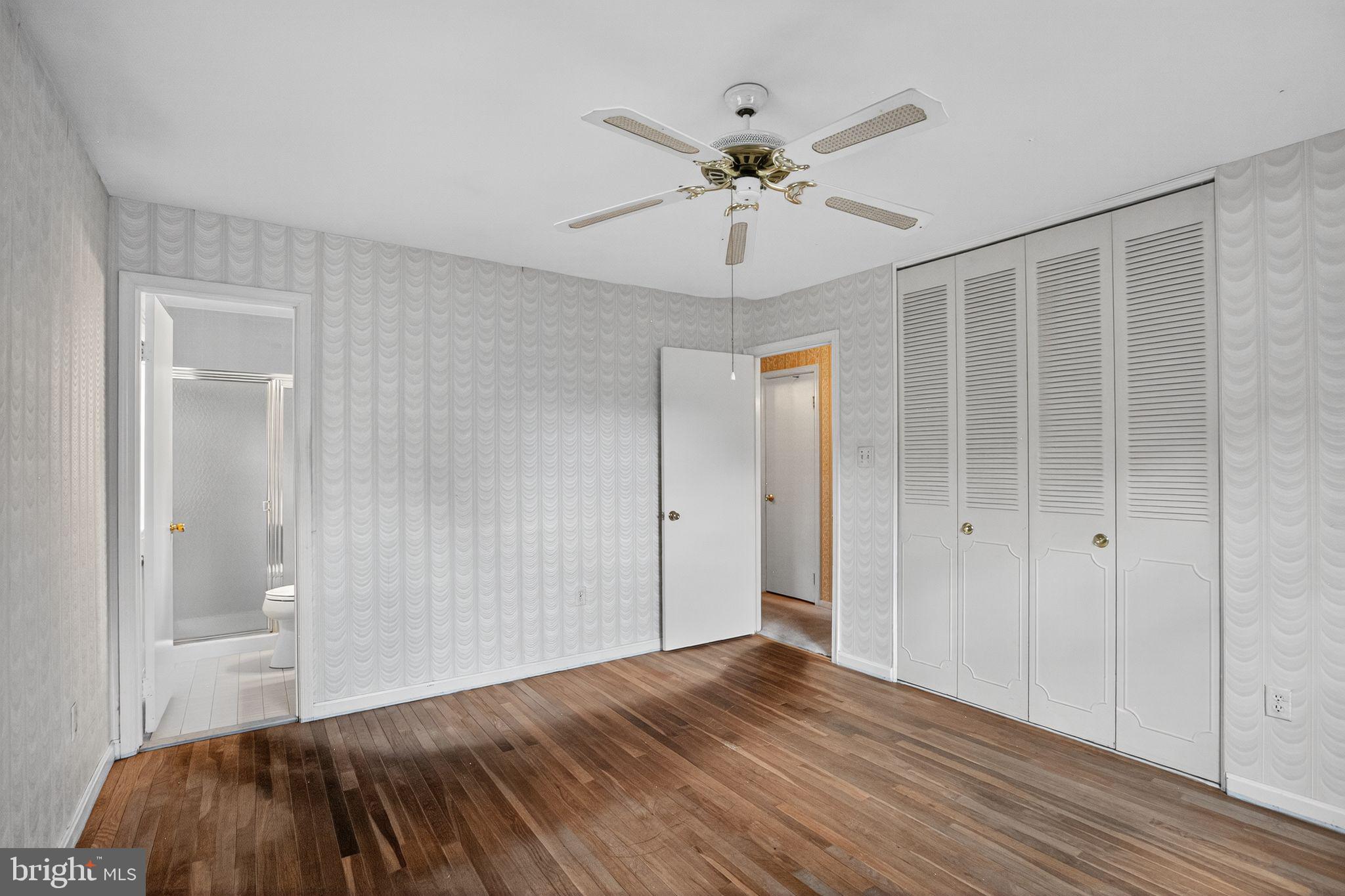 7374 Roxbury Avenue Manassas, VA 20109 - Photo 10 of 42 a view of a livingroom with a hardwood floor and hallway