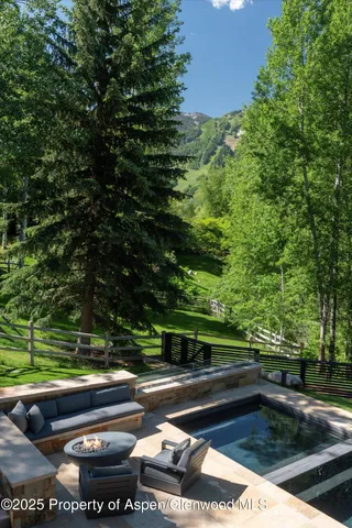 a view of a yard with a bench