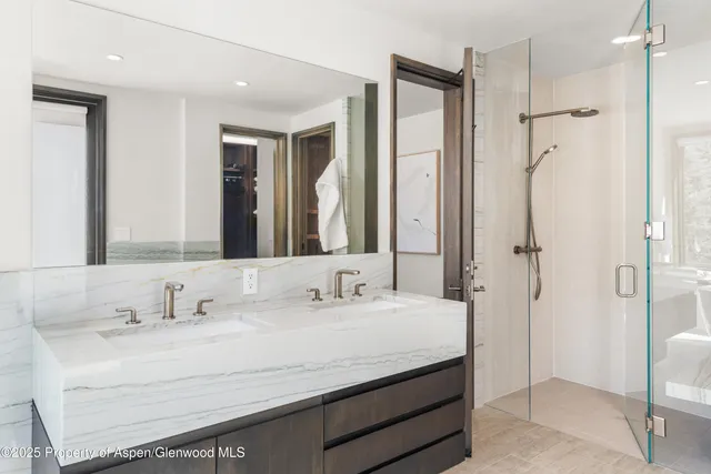 a backyard of a house with outdoor seating