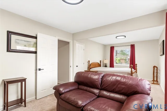 a bathroom with a toilet a sink and a mirror