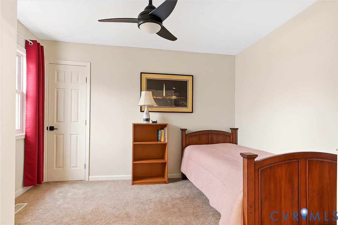 517 West Riverside Drive Lanexa, VA 23089 - Photo 25 of 31 a bedroom with furniture and closet