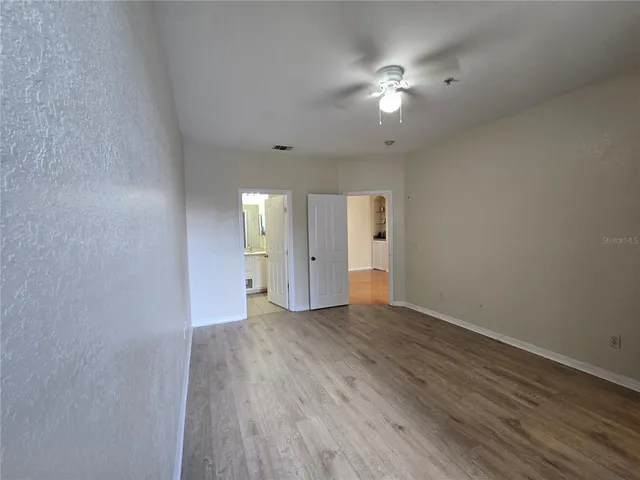 a view of a room with racks on the wall