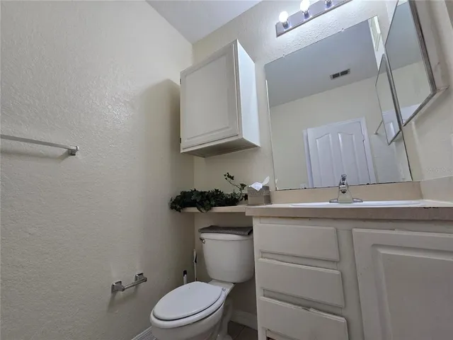 a view of street with parked cars