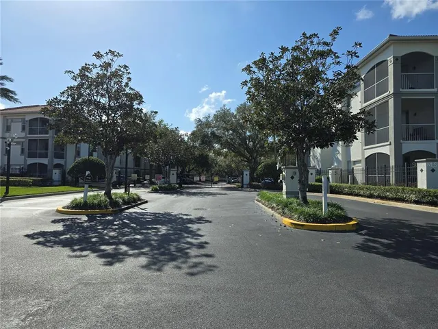a view of a park with plants and trees