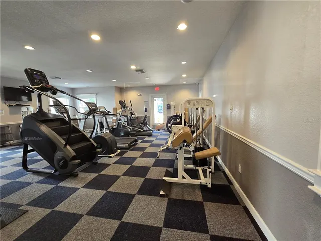 a view of a swimming pool and a yard