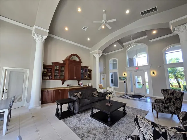 a view of a swimming pool with a patio