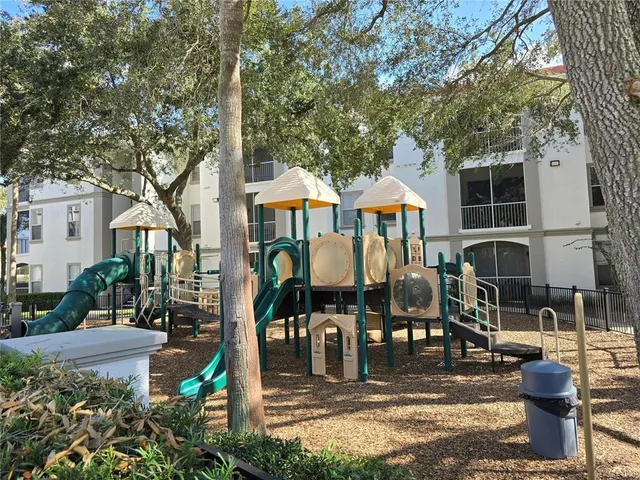 a view of a swimming pool and a yard
