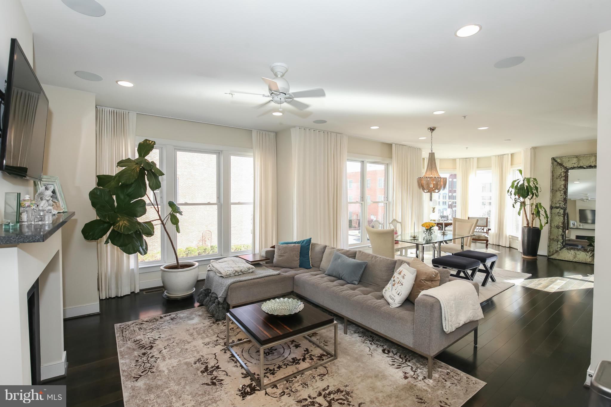 312 L Street Southeast Washington, DC 20003 - Photo 13 of 29 a living room with furniture fireplace and a large window
