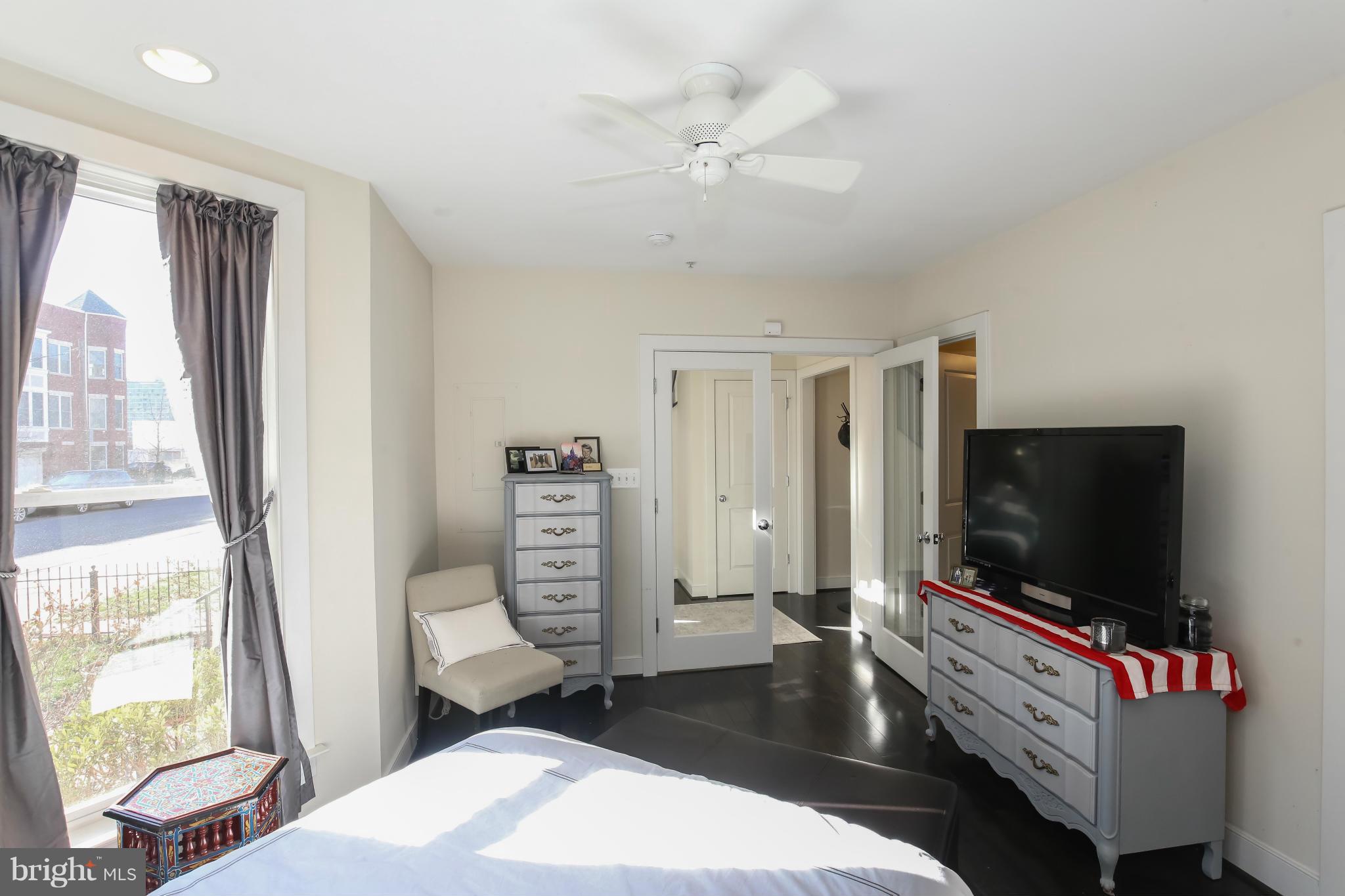 312 L Street Southeast Washington, DC 20003 - Photo 3 of 29 a living room with furniture and a flat screen tv