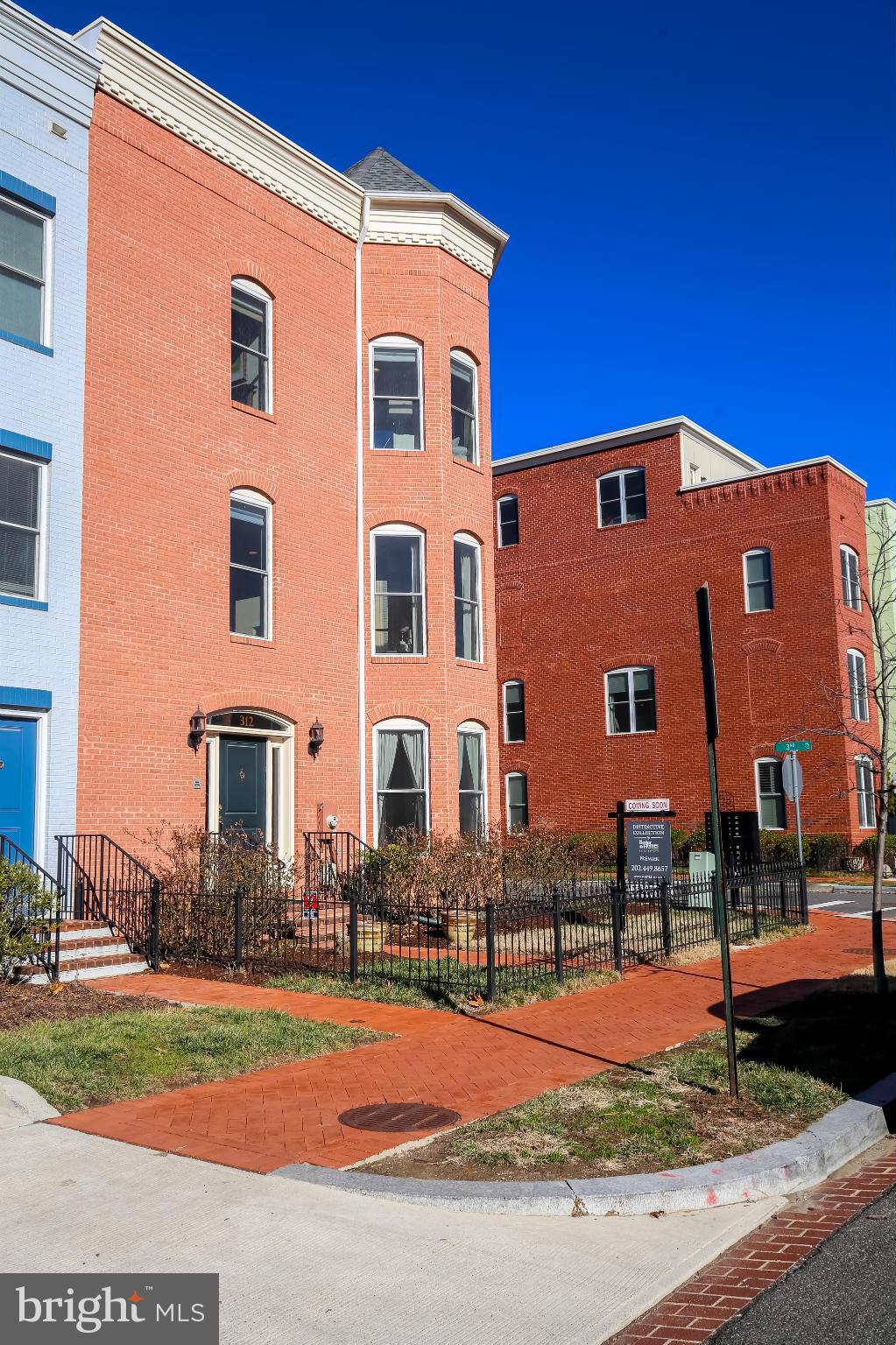 312 L Street Southeast Washington, DC 20003 - Photo 24 of 29 a front view of a house with yard