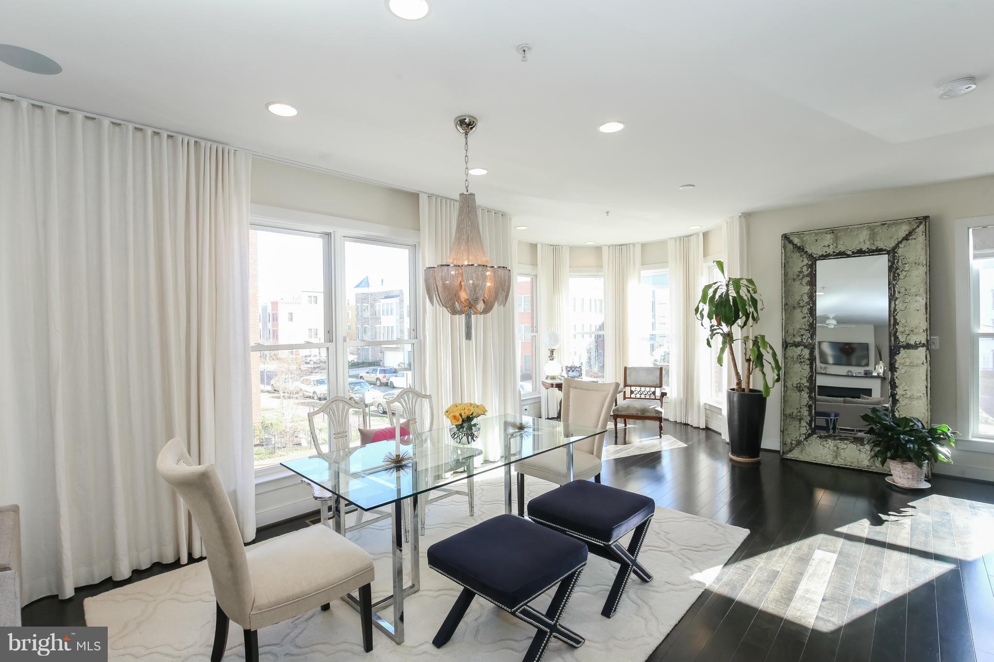 312 L Street Southeast Washington, DC 20003 - Photo 5 of 29 a living room with furniture and a large window