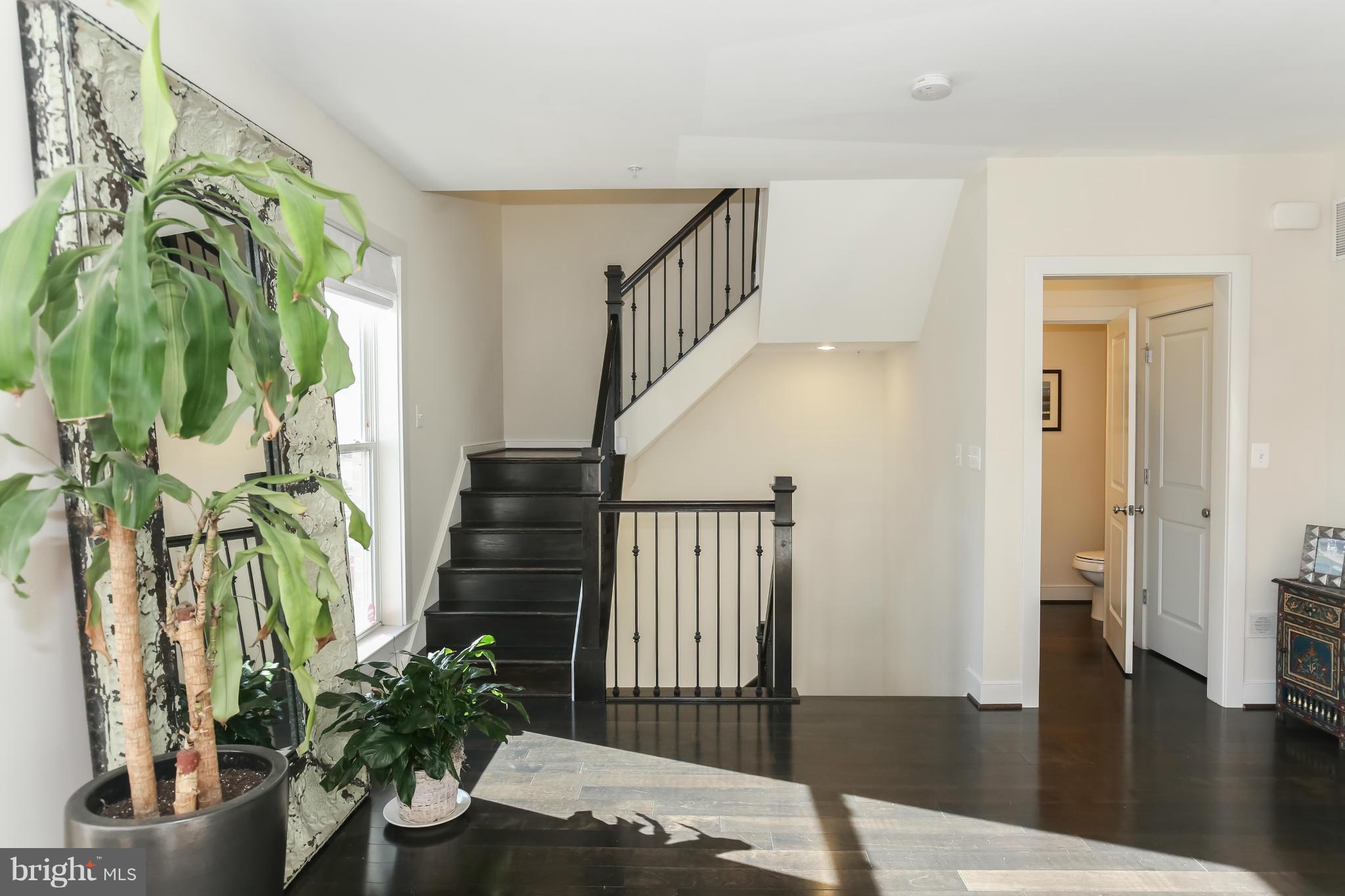 312 L Street Southeast Washington, DC 20003 - Photo 10 of 29 a view of entryway with wooden floor