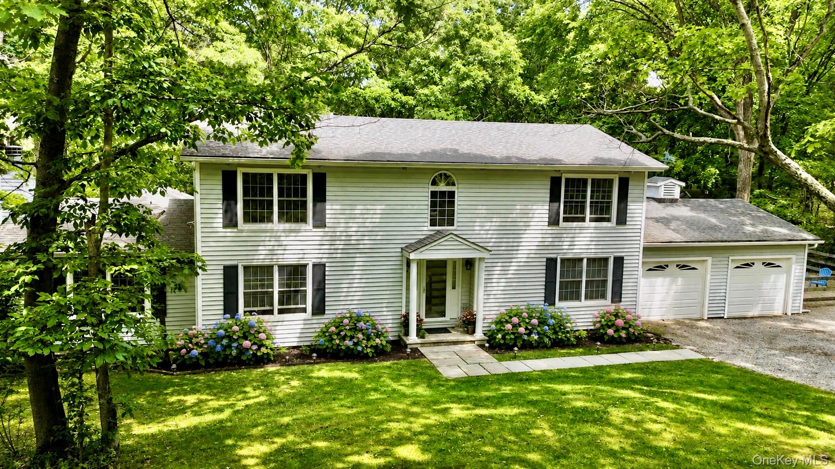 33 Willow Brook Ridge Clinton Corners, NY 12514 - Photo 1 of 50 a front view of a house with a yard