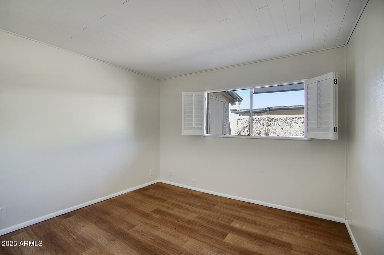 1320 East Bethany Home Road, Unit 24 Phoenix, AZ 85014 - Photo 9 of 16 Guest Bedroom