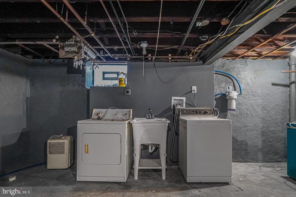 644 Meetinghouse Road Elkins Park, PA 19027 - Photo 38 of 39 Functional laundry space in a basement.