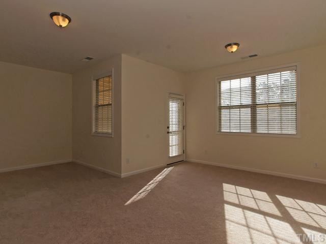 8317 Primanti Boulevard Raleigh, NC 27612 - Photo 16 of 21 LOWER LEVEL GUEST SUITE INCLUDES A FULL BATH! THIS COULD ALSO BE USED AS A BONUS ROOM OR PLAYROOM!