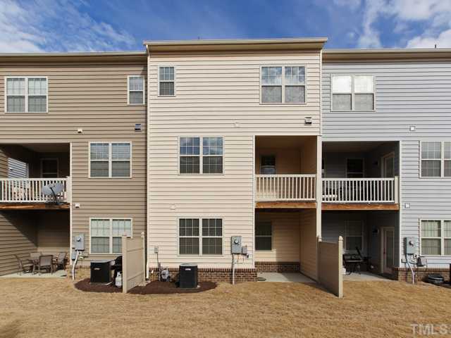 8317 Primanti Boulevard Raleigh, NC 27612 - Photo 19 of 21 REAR VIEW OF HOME! PRIVACY FENCING ON EITHER SIDE!