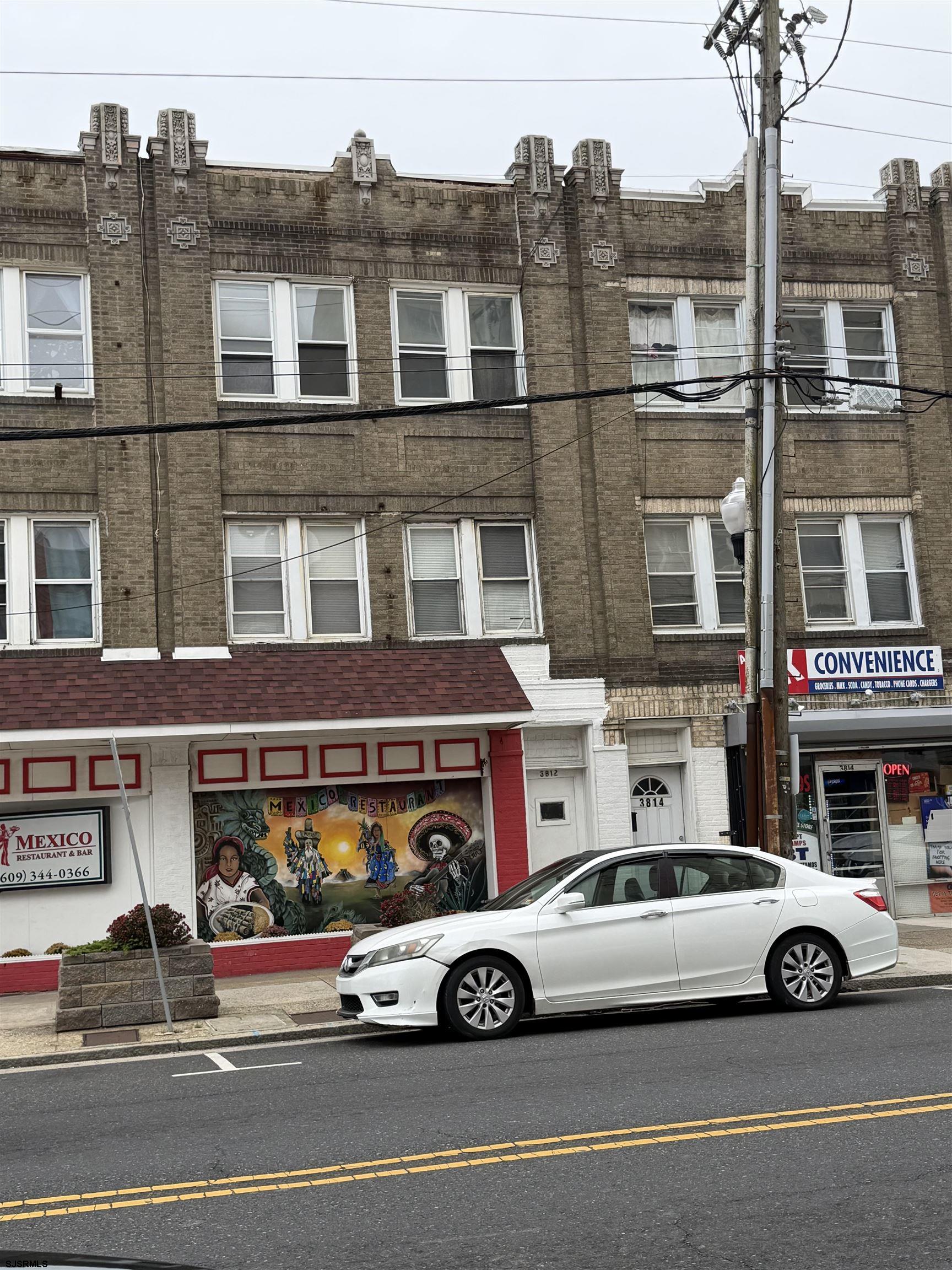 a car parked in front of a building