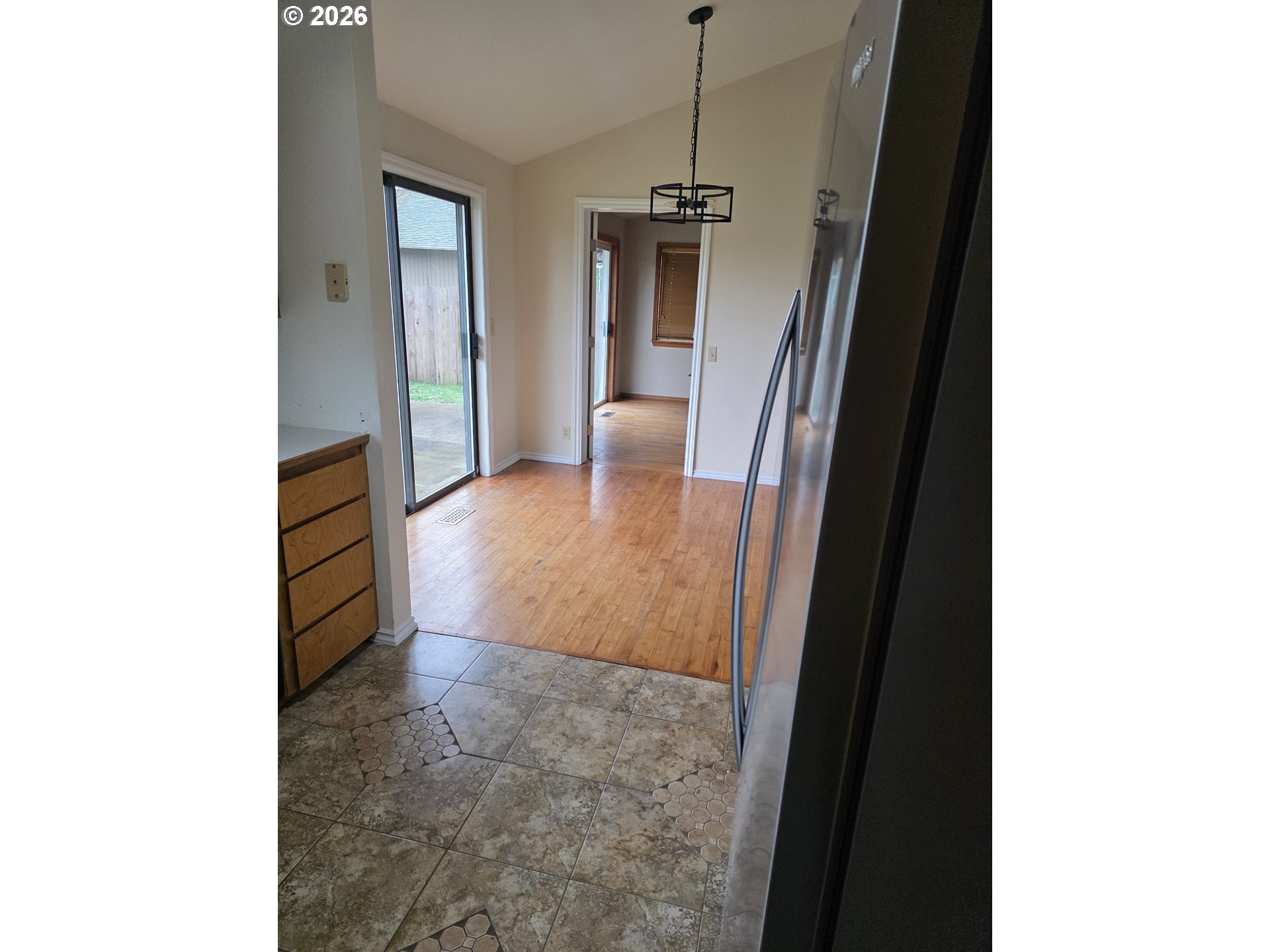 557 South 44th Street Springfield, OR 97478 - Photo 7 of 24 a view of a hallway with wooden floor