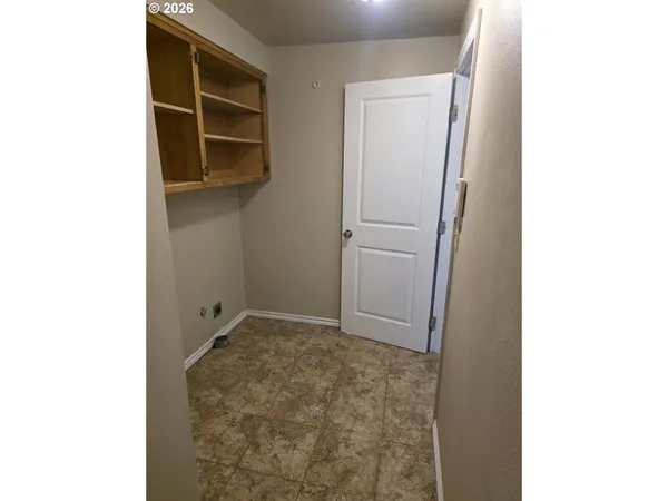 a view of small space with racks on the wall
