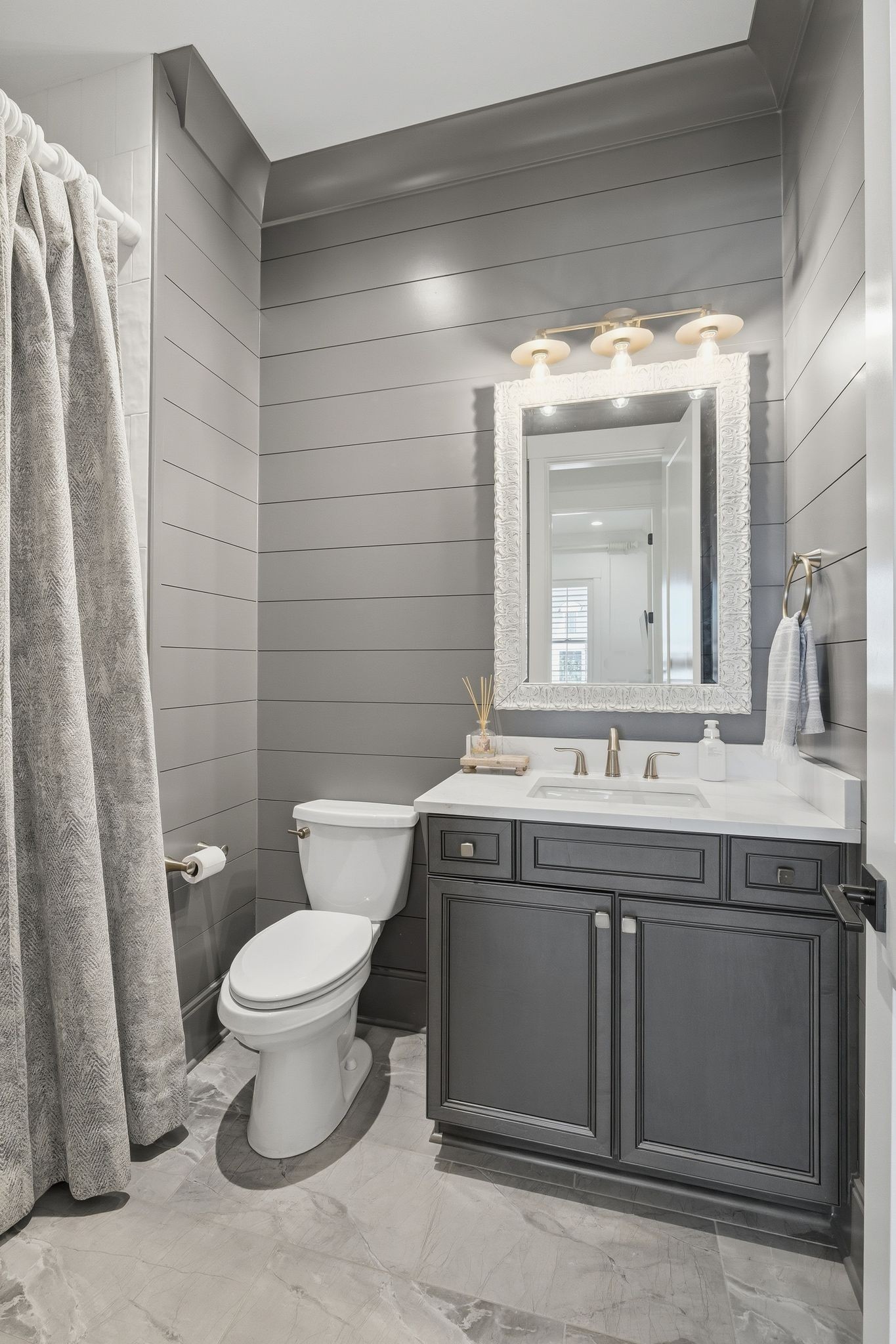 1733 Rigsby Avenue Murfreesboro, TN 37129 - Photo 29 of 57 a bathroom with a sink toilet and mirror