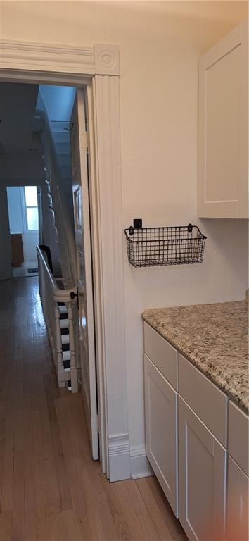 548 South Graham Street Pittsburgh, PA 15232 - Photo 31 of 49 a kitchen with a refrigerator and cabinets
