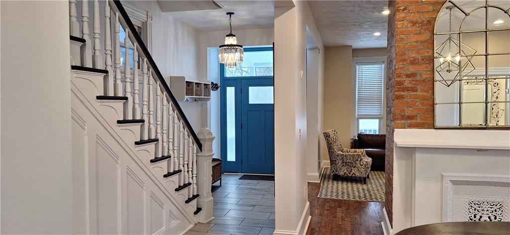 548 South Graham Street Pittsburgh, PA 15232 - Photo 8 of 49 a view of entryway and hall with wooden floor