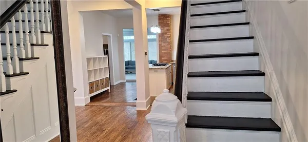 a living room with furniture and a table