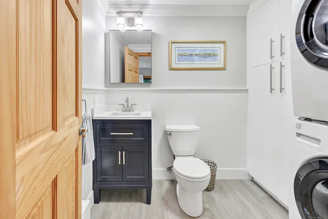 a bathroom with a toilet and a sink