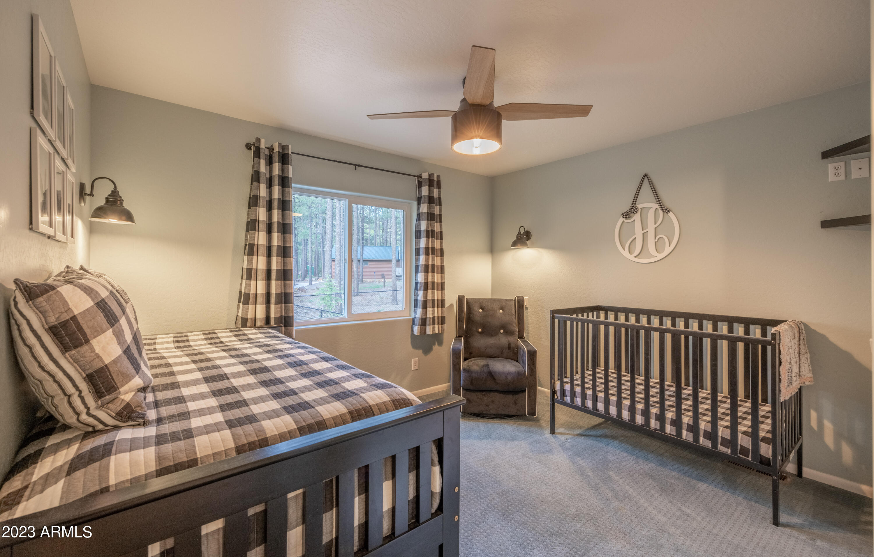 2772 Larson Loop Forest Lakes, AZ 85931 - Photo 24 of 65 a bedroom with a bed and window