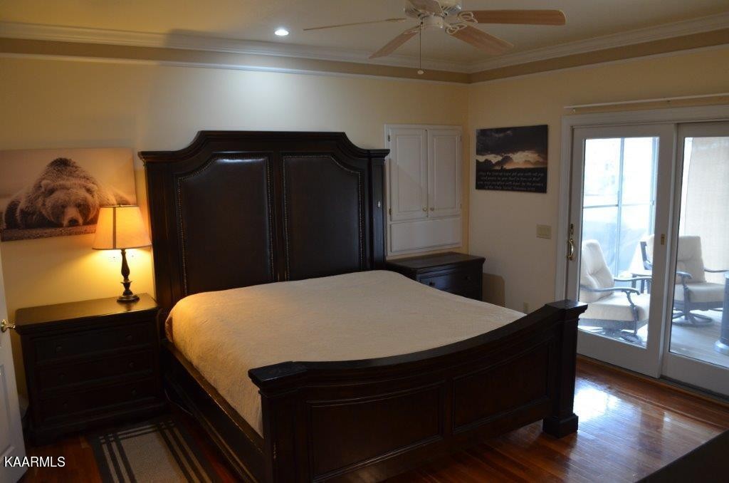 13 Hampton Point Crossville, TN 38558 - Photo 11 of 45 a bed sitting in a bedroom next to a window